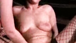 Chained woman in suspension bondage takes harsh pussy clamps