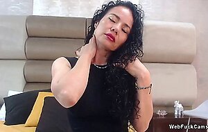 Amateur mature Latina solo in bed on webcam