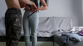 Brunette beauty rides her man's big cock on the couch