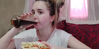 Eating an omelette sandwich with cherry tomatoes