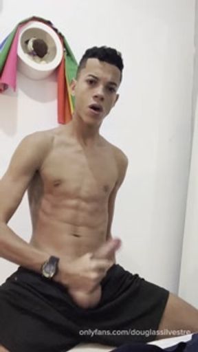 Young man with hard penis in his room while recording and touching his big dick