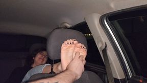 Tickle the feet with black nails of an Latina girl with a comb and hands in the car (both feet)