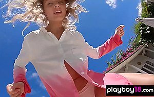 Skinny blonde ukrainian teen Clarise reveals her small tits in the pool