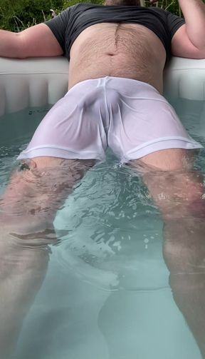 Pool cum in revealing shorts and t-shirt