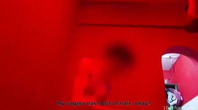 Interracial sex filmed in a dimly lit brothel