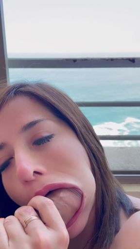 Fucks my mouth on the balcony in front of the sea(amateur Latin sex)
