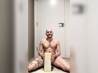 Hungry locked bottom playing with massive 10 inches monster sex toy