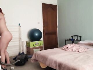 Redhead shows how that babe cleans her room