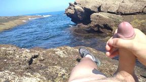 Jerking off a Big Hard Dick Overlooking the Sea in the Beach Cove Until He Cums