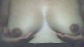 Chubby Asian amateur lady flashes her big saggies on webcam
