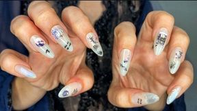 Halloween nail decor on elegant fingers