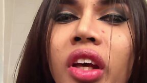 Ladyboy with huge cock strokes, comes and drinks own cum