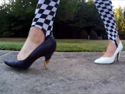 Crossdresser in short dress and heels walking around a park