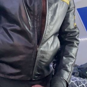 Bearded guy in leather jacket fucks his leather glove