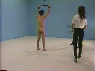 Erotic whipping with two naked mistress