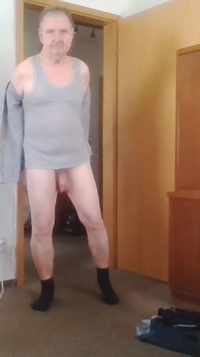 Andreas with suspender belt and bra jerking off