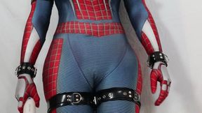 Silicone Doll Wakes Up Locked Inside Skintight Spiderman Zentai Suit and Blinds, Gags, & Vibrates Herself