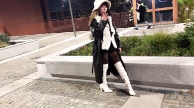 White boots squeezed tight by smoking Latin Dominatrix