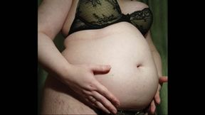 Fatty plays with her big fat belly and grown boobs in tight lingerie