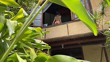 My next door neighbor spies on me while I masturbate and play on the second floor window