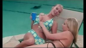 Hot busty blonde eats and fingers hotter blonde'_s pussy poolside