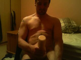 Sitting on chair watching porn banging a felsh light untill I ejaculate
