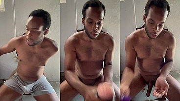 Jeff419 in gray masturbating for fans on his chair.