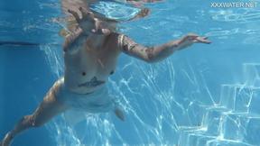 ”Naked Finnish blonde inked mermaid Mimi underwater”