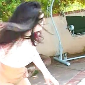 A charming girl in white stockings gets hardcore double penetration by the pool