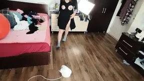 Amateur wife has fun trying on clothes and cutting them