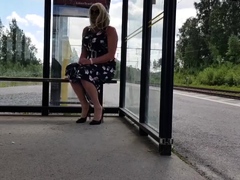 HannaTransa Chastity Crossdresser outdoors at train station.