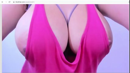 latina in pink seduces me with her big tits