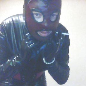 LatexPeti wear Latex catsuit ,gloves and smoking