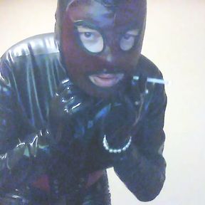 LatexPeti wear Latex catsuit ,gloves and smoking