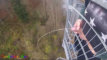 I pee outside from a very public observation tower and then masturbate my penis, and my balls are fat. But then people came along...