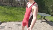 Confined guy in wrestling suit