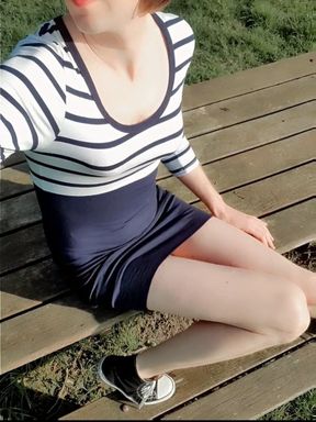 Risky outdoor piss on picknick bench