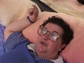 Old fat woman has solo sex in her bed with a dildo