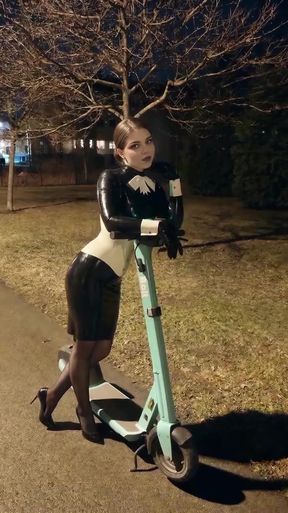 Latex fetishist plays with gloves