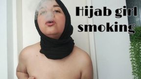 Hijab girl topless smoking and blowing smoke on your face