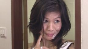 Thai MILF gets facial from large foreign rod