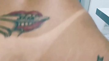 Tattooed woman, Amanda Souza is moaning while getting fucked hard, in front of the camera