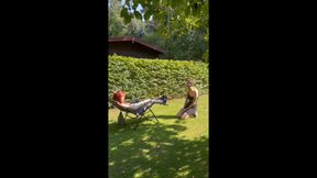 Submissive slave girl publicly worships the feet of the Goddess