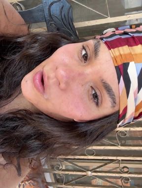 Athletic solo babe gives a public blowjob