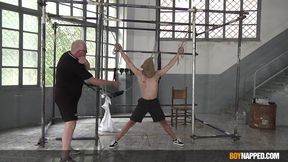 Twink Jonny Montero gets his cock played by Master Kane
