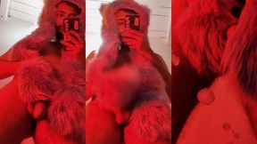 red fluffy devil with a big uncut cock fills the mirror with cum