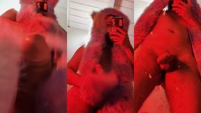 red fluffy devil with a big uncut cock fills the mirror with cum