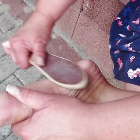 Outdoor foot care on the left foot