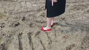 Louboutin in deep mud, louboutin stuck in mud and ground, high heels wrecked in puddles
