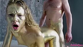 Beauty In Gold Paint Sucks Cock And Fuck